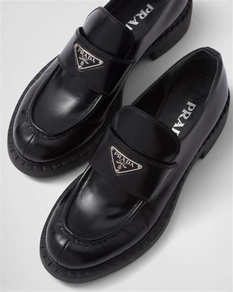 prada loafers with gold logo|Prada black loafers women.